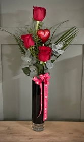 Red rose vase